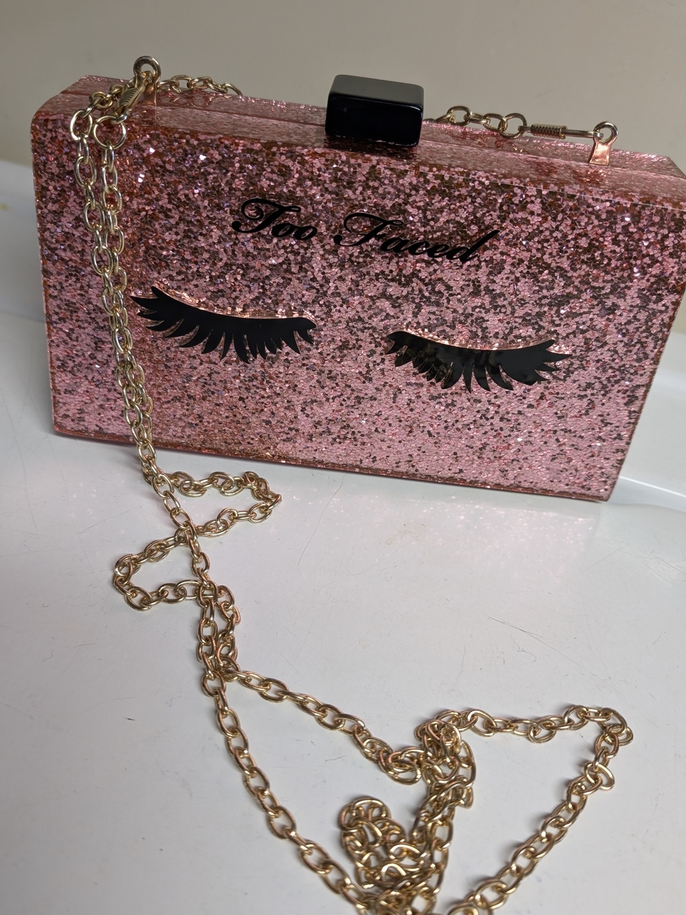 Too Faced Pink Glitter Eyelash Clutch with Gold Chain